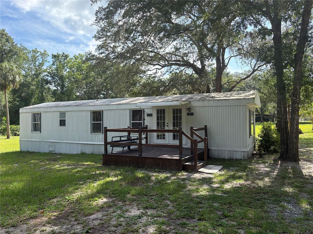 Photo of 15210 NE 144th Street, Fort Mccoy, FL 32134 (MLS # OM726907)