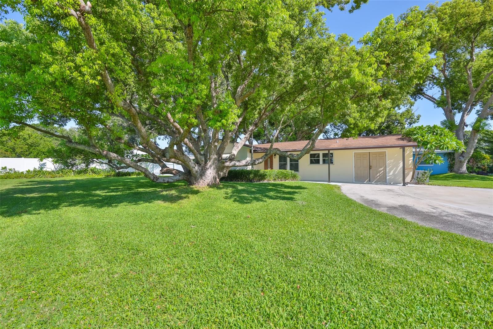 This property is located in a Non-Evacuation Zone sitting high and dry with a 66' to 70' elevation. It is a unique property in that looking out the front of the house the land to the south is vacant and owned by the county.
Open floor plan with a large living room adjoining a spacious family room that measures 21'0 X 11'0.
Bonus room that measures 10'8 X 26'0 and has a tiled shower, toilet and sink. The laundry is also located in this room. This room could easily be converted into a third bedroom as well as expand the contiguous kitchen into the area.
5.4 miles from the Gulf beaches.
1.5 miles from the famous Pinellas Trail.
The house has double-hung impact windows.
Roof was replaced in 2009.
3-ton AC installed in 2022.
Tankless water heater was installed in 2024.
200 amp breaker panel was installed in 2024.
Mini-split AC/Heat is in the master bedroom.
1.5 year-old high-end washer/dryer.
1.5 year-old range/stove.
Well with 3 well-points and four-zone sprinkler system for the yard (sprinkler pump was replaced in 2023).
Exterior 50amp hook-up for RV.
Heavy-duty steel shed 10'2 X 13'10.