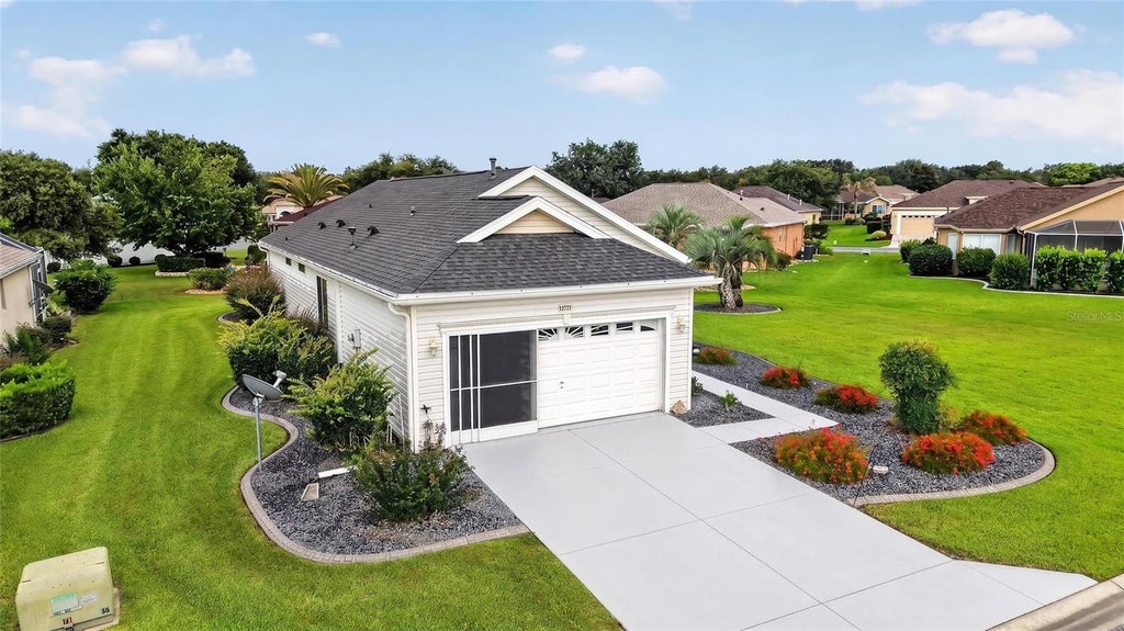 Photo of 12771 SE 92nd Terrace, Summerfield, FL 34491 (MLS # OM727635)