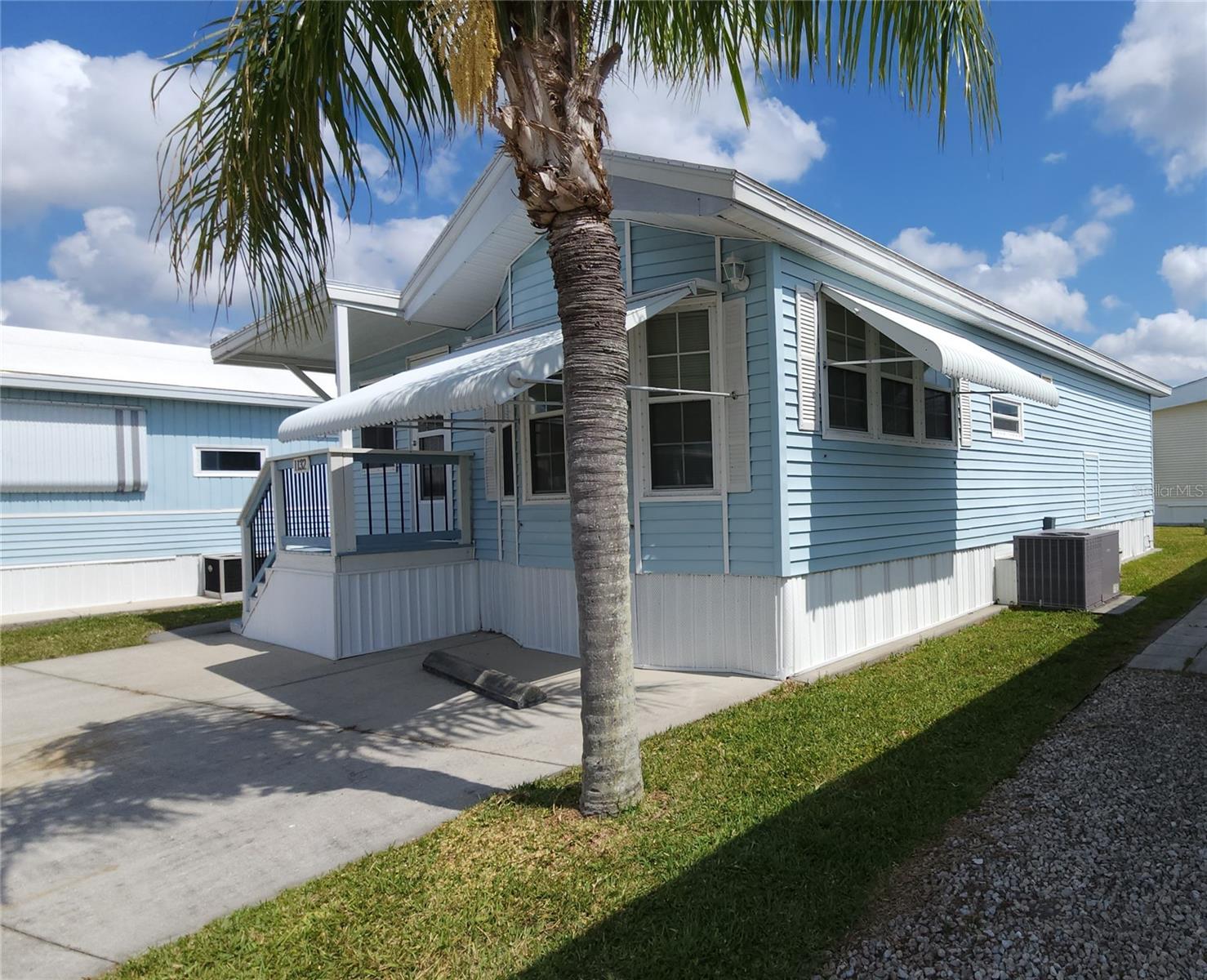 START ENJOYING FLORIDA IN THIS WELL-KEPT ONE BEDROOM, TWO BATHROOM MOBILE HOME IN AN ACTIVE 55+ COMMUNITY. This cheerful home is currently furnished with an eat-in kitchen and adjacent living room. Or mix it up and have a larger dining area. The large family room provides plenty of space to entertain or watch your favorite shows. The bedroom has two en suite full bathrooms. One bathroom has a laundry closet and extra storage closet. The other bathroom has a tub/shower and linen storage. Sold turnkey. Vinyl windows; all plumbing has been replaced; membrane roof (2021); central A/C (2022). 6'X10' built-on storage shed. SUGAR CREEK COUNTRY CLUB CO-OP HAS LOW HOA FEES of just $525 quarterly which includes water, trash, sewer, basic cable, internet, and grass mowing. There is an active social calendar with fun activities and outings during the winter months. Enjoy this community's proximity to the Braden River and River Links Golf Course. Sorry this is not a dog lot.
