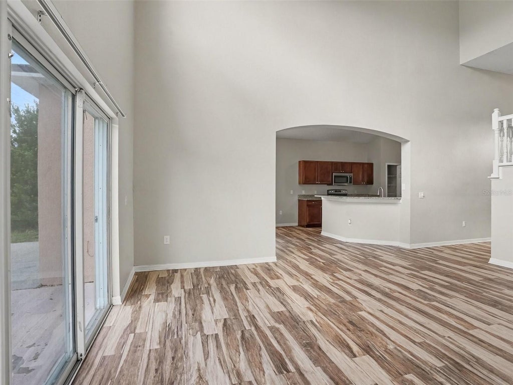Photo of 515 Peace Drive, Poinciana, FL 34759 (MLS # O6443105)