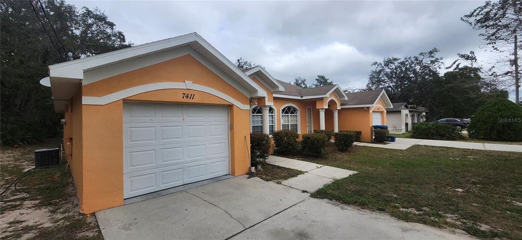 Photo of 7411 Canterbury Street, Spring Hill, FL 34606 (MLS # W7881244)