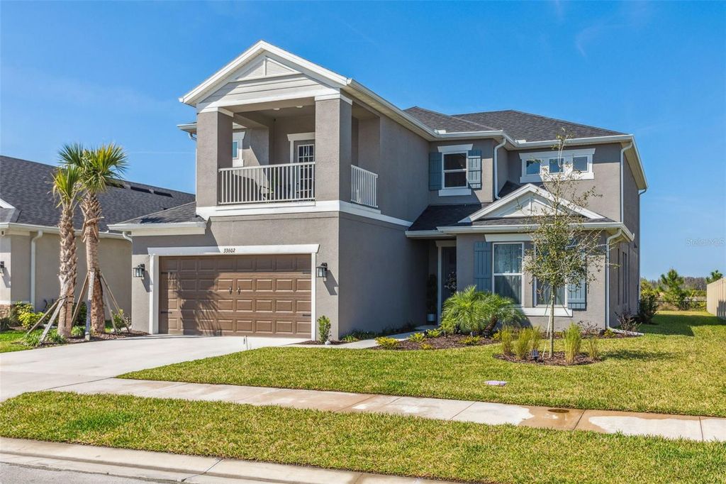 Photo of 33602 Castaway Loop, Wesley Chapel, FL 33543 (MLS # T3511269)