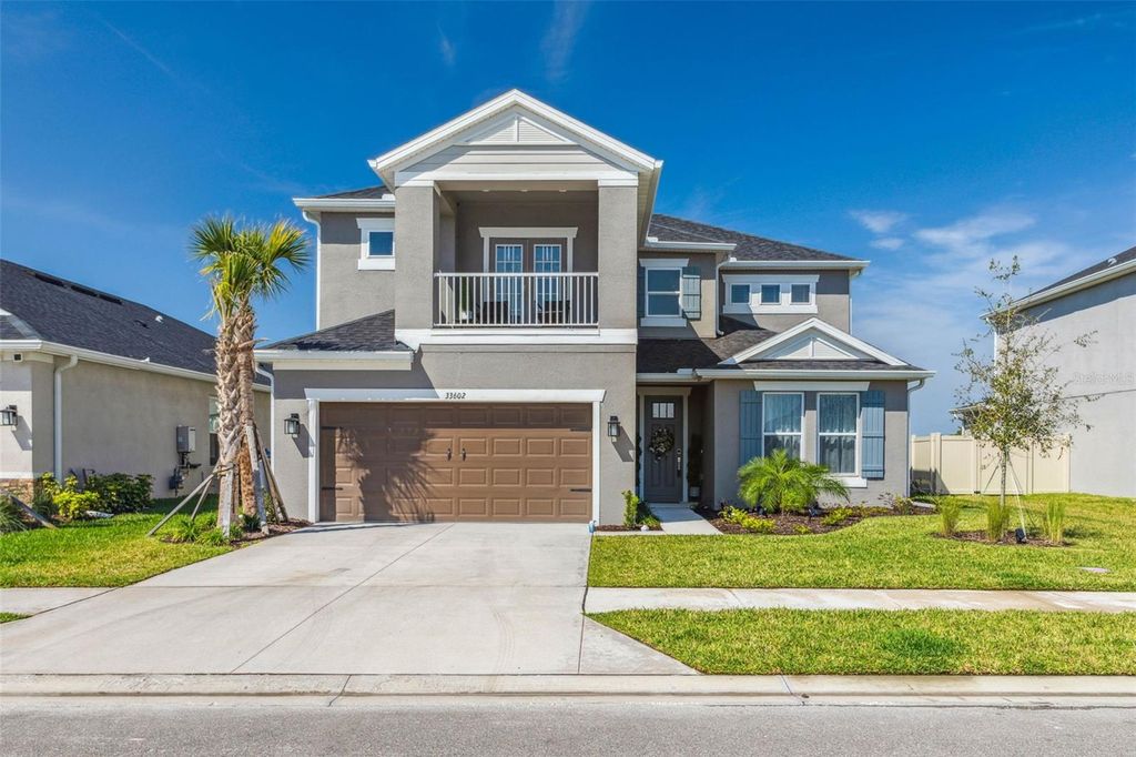 Photo of 33602 Castaway Loop, Wesley Chapel, FL 33543 (MLS # T3511269)