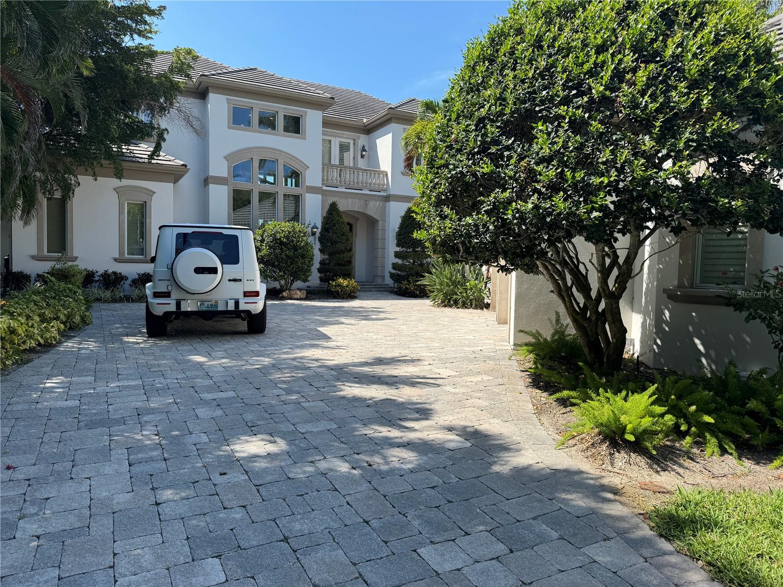 Lighthouse Pointe- One of Florida's West coast premier addresses. Located behind the gates of The Longboat Key Club with an additional code entry gate opening to 16 eclusive waterfront homes. This masterpiece faces New Pass and out to the Gulf ofMexico. This enclave provides security plus a tennis court and beach walking plus boat docks are available. This stunning 5 bedroom home plus office and theater room has gorgeous windows providing Gulf and pass views. Marble floors plus incredible finishes are evident through-out the home. The infinity edge pool gulf side is a perfect setting for enjoying relaxing poolside plus entertaining guests.