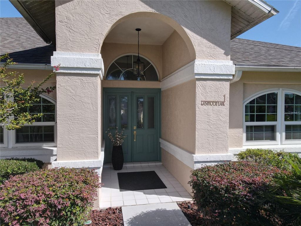 Photo of 1 Eastmoor Lane, Palm Coast, FL 32164 (MLS # O6425852)