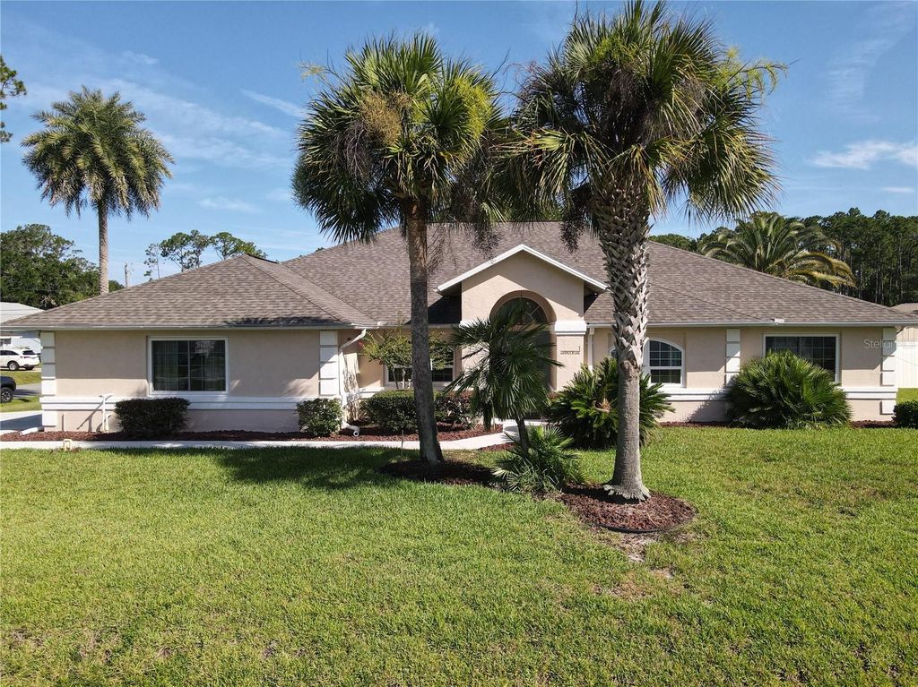Photo of 1 Eastmoor Lane, Palm Coast, FL 32164 (MLS # O6425852)
