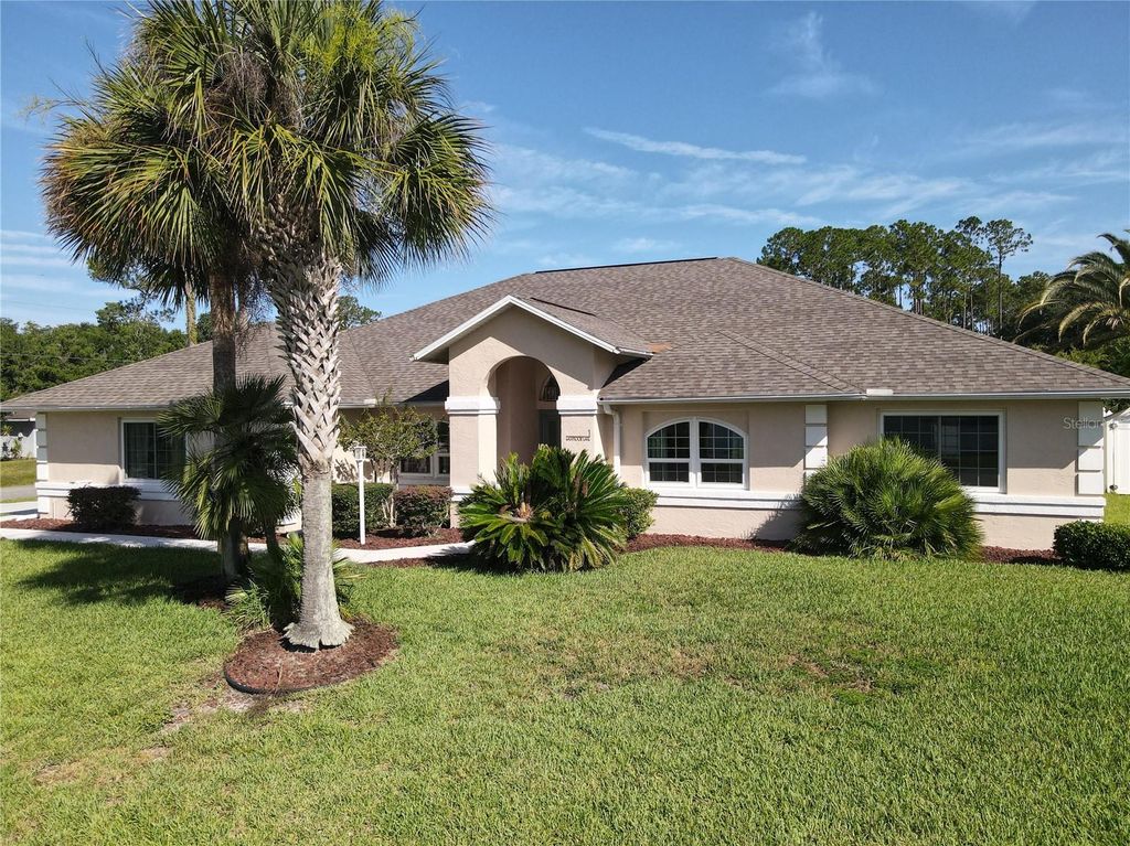 Photo of 1 Eastmoor Lane, Palm Coast, FL 32164 (MLS # O6425852)