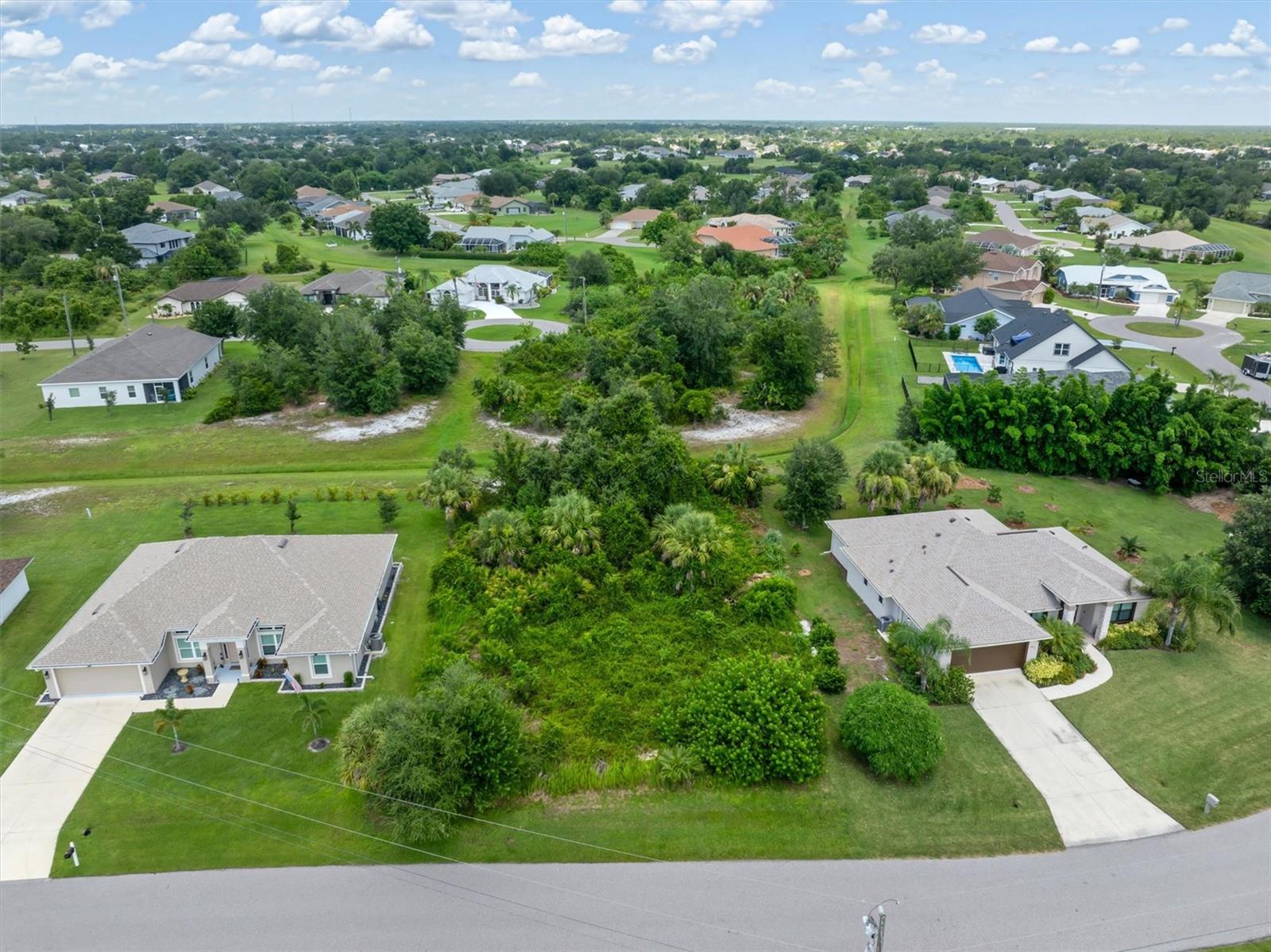 Build your dream home in the desirable, deed-restricted community of Deep Creek in Punta Gorda! This vacant lot is ideally situated on a quiet street surrounded by well-maintained homes, offering the perfect blend of privacy and convenience. Not in a flood zone. Deep Creek features public water and sewer, and beautiful greenbelt areas that provide extra space and scenic views. Located just minutes from shopping, dining, I-75, and historic downtown Punta Gorda, as well as Charlotte Harbor and the beautiful Gulf beaches. Whether you're ready to build now or planning for the future, this is a prime opportunity to invest in one of Southwest Florida’s most sought-after communities.