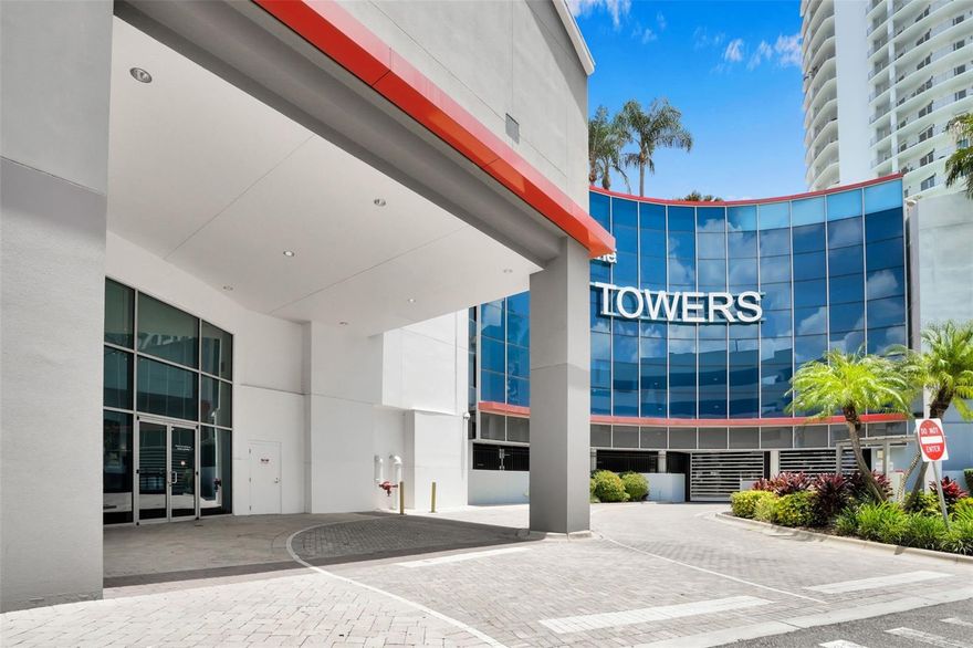 Welcome to the exclusive Towers of Channelside PENTHOUSE, presenting an unmatched standard of luxury in the heart of Tampa. This impressive 3-bedroom, 3-bathroom residence delivers a refined living experience with extraordinary features and BREATHTAKING PANORAMIC VIEWS. With 10-foot ceilings and expansive 9-foot sliders/windows, the recently updated living area is filled with natural light and elevated style. The home showcases two HUGE COVERED BALCONIES overlooking Sparkman Wharf and the Port of Tampa, ideal for watching cruise ships depart or enjoying the sweeping vistas of Hillsborough Bay. Elegant design and high-end finishes define the interior, including CARRARA MARBLE FLOORS, crown molding, power blinds, 2-zone AC with Nest thermostat, and modern Legrand Adorne switches/outlets enhancing each room. The chef’s kitchen was just beautifully renovated and now features a double wall oven, 42” GE Profile refrigerator, Omega European cabinetry w/ soft-close drawers/doors, a zero-edge sink, and brand new porcelain countertops.  A dry bar w/ built-in wine and beverage fridge offers seamless entertaining. The spa-inspired primary bathroom boasts Quartz countertops, DOLOMITE MARBLE FLOORS, Omega Cabinetry, added outlets, cable access, a floating tub, lit vanity mirrors, wall-mount taps, and a floor-to-ceiling glass shower w/ rain head, body jets, & hand sprayer. Secondary baths feature marble flooring, quartz counters, and frameless enclosures. A new hot water recirculating pump ensures instant hot water while improving efficiency. The home is prewired for surround sound and includes a self-cleaning hot water tank. The spacious layout also features a DEN/STUDY that can function as a 4th bedroom, offering outstanding flexibility for guests or a private office. FOUR DESIGNATED PARKING SPOTS further enhance the appeal—an exceptional luxury in downtown living. Residents enjoy premium amenities including full-time concierge service, clubhouse, and the crown jewel—an iconic RESORT-STYLE POOL widely regarded as the finest in Tampa. New elevators in both towers are currently being installed (PAID). PETS ARE WELCOME, with two off-leash areas available for convenience. The location is unparalleled: just one block from Amalie Arena and a half-block from Publix, with immediate access to dining, entertainment, and shopping. The free trolley to historic Ybor City is steps from the entrance, and the Riverwalk, Channelside District, Water Street, parks, and major downtown attractions are all nearby. With quick access to major highways, Tampa’s renowned beaches and leisure destinations are only a short drive away. For those seeking a lifestyle where luxury meets convenience, this extraordinary penthouse stands above the rest. Elevate your everyday living and experience Tampa at its absolute finest.