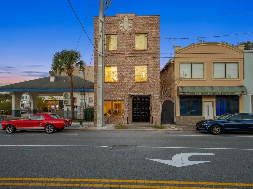 Discover the charm of downtown Daytona Beach, with this stunning historical brick home at 307 S Palmetto Ave. This exceptional three-level property, steeped in history, has been meticulously upgraded to offer modern elegance while retaining its original character. SHORT-TERM RENTALS ALLOWED - No restrictions! Each floor is painted in a crisp white from floor to ceiling, beautifully complemented by striking black and natural wood accents. With both COMMERCIAL and RESIDENTIAL ZONING, this property presents a fantastic investment opportunity. The versatile first-floor unit can serve as a dynamic space for a variety of businesses, from a trendy hair salon to a professional office, catering to the vibrant local community and attracting visitors alike. Ascend to the second floor, where you will find the main living area, dining area, and a contemporary kitchen that opens to a delightful balcony through sliding glass doors— perfect for enjoying the fresh coastal air. The half bathroom adds convenience for both residents and guests.

On the third floor, the master suite is a true retreat, featuring an en-suite bathroom that has been fully updated with luxurious floor-to-ceiling natural ceramic tiles, dual vanities, and a spacious walk-in double shower. This floor also includes a guest bedroom, a large laundry room, and another balcony that offers stunning views of the city and magnificent sunrises - ideal for relaxation or curling up with a book.

Located in the heart of Daytona Beach, this property is surrounded by a lively atmosphere that appeals to locals and tourists alike. Enjoy the proximity to beautiful beaches, an array of dining and shopping options, and vibrant cultural attractions. Whether you're looking for a unique residence or a promising commercial investment, 307 S Palmetto Ave is a remarkable opportunity not to be missed.