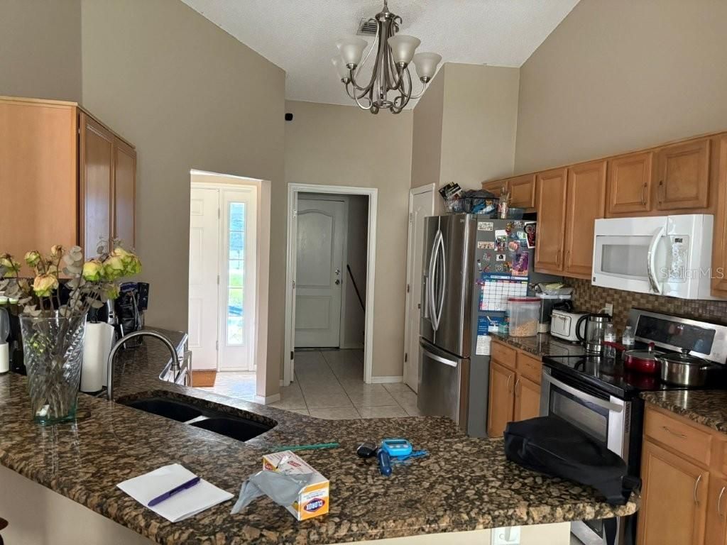 Photo of 1404 Punta Gorda Drive, Poinciana, FL 34759 (MLS # S5137523)