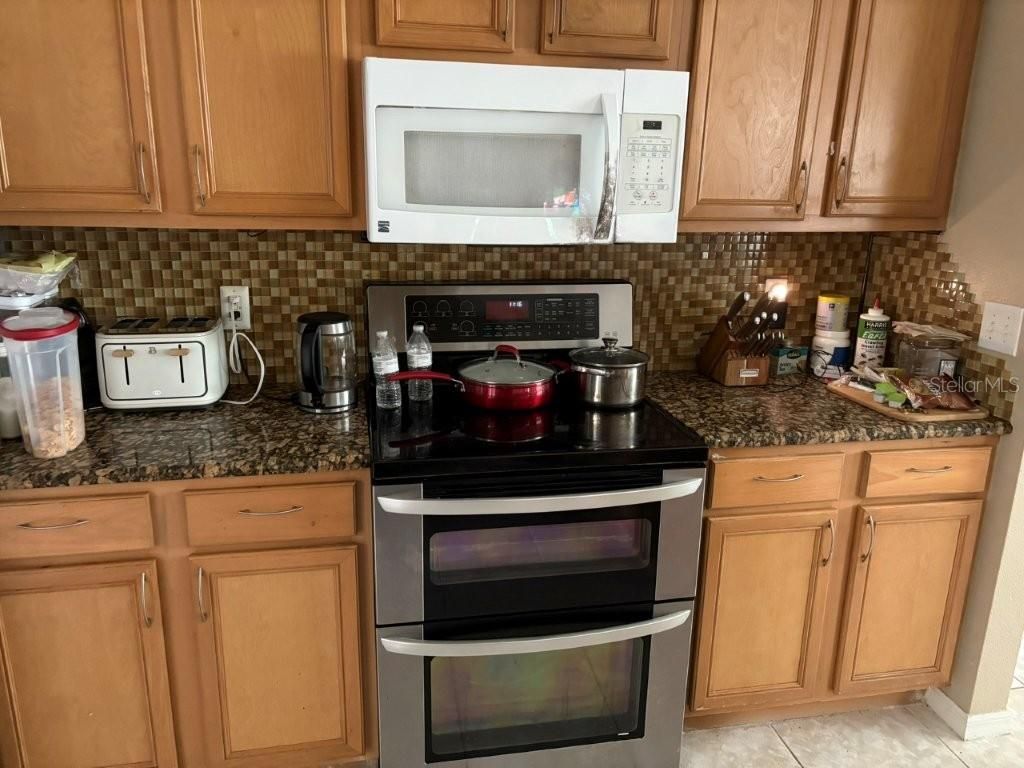 Photo of 1404 Punta Gorda Drive, Poinciana, FL 34759 (MLS # S5137523)