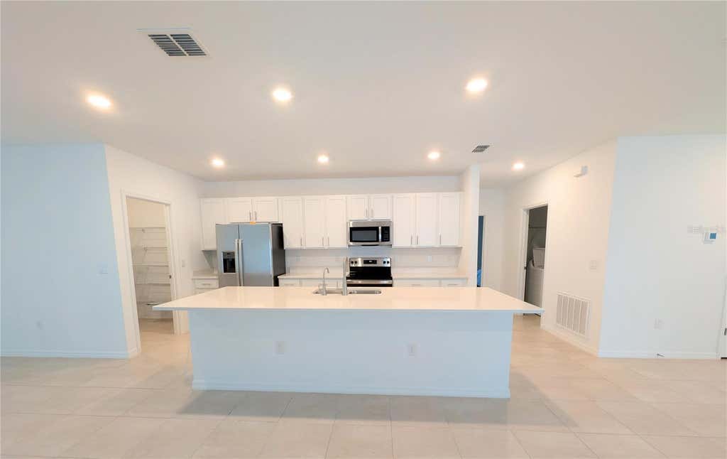 Photo of 243 Amber Way, Kissimmee, FL 34758 (MLS # O6434119)