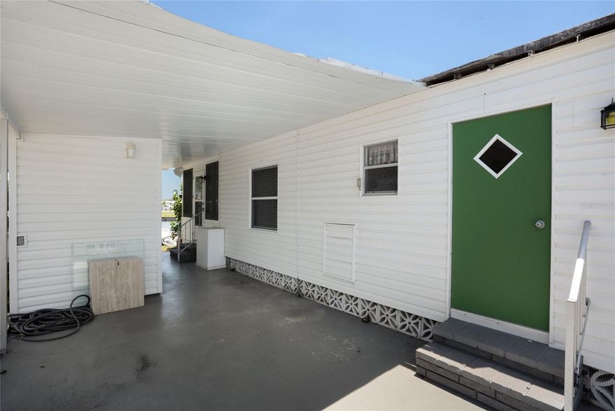 Welcome to your new sanctuary—a delightful 2-bedroom, 2-bathroom haven nestled in the heart of Oakwood Manor community. This is not just a home; it’s a lifestyle set on over 90 acres of lush greenery! Picture yourself living like you’re on a perpetual vacation in a gated, 55+ community where peace of mind is truly at your doorstep. With the seller offering a one-year Home Warranty, your peace of mind is fully assured. 
Built in 1972 and lovingly maintained, this 1,199 sq. ft. jewel is more than ready to welcome you home. Although the carport might need a little love, the property makes up for it with a delightful water view that captivates the senses. Imagine sipping your morning coffee with serene vistas in the background, just steps away from the vibrant clubhouse and crowd-pleasing community amenities. 
Oakwood Manor enhances your living experience with impressive features and activities. For just $190 per month, the community offers a large clubhouse that’s at the heart of the action. From a commercial kitchen and event stage to a fitness room and a cozy library, there’s something in it for everyone. Whether you’re unwinding in the heated pool, soaking in a spacious hot tub, or enjoying a lively match of bocce ball or ping pong, this is retirement living at its finest! 
And let’s not forget the delightful surroundings! Your new home is perfectly positioned next to the scenic Legacy Trail and brand-new city pickleball courts. When you’re ready for a change of pace, a short trip lands you in the hustle and bustle of downtown Sarasota, the chic shops of St. Armands Circle, or basking on the sandy shores of the world-renowned Siesta Key Beach. These are far more than landmarks—they're adventures waiting to happen! 
Remember, life here is as vibrant as you make it. While pets and motorcycles won't join your journey, the community hums with the gentle rhythm of a friendly neighborhood embracing you like family. 
Ready to dive into the delightful rhythms of Oakwood Manor living? Reach out today to your favorite Realtor and make this dream your reality!