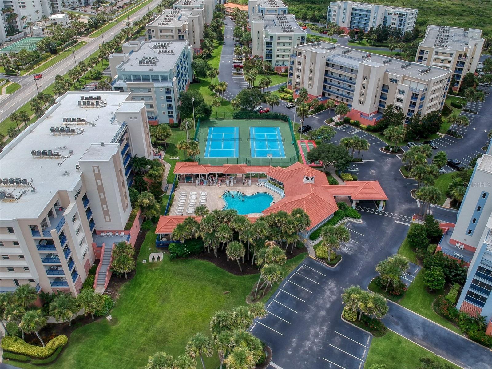 THIS BEAUTIFUL FURNISHED TWO BEDROOM AND TWO BATH CONDO IN OCEAN WALK. THE SECOND YOU WALK IN YOU FEEL ON VACATION. MOVE-IN READY WITH BEAUTIFUL FURNISHINGS. YOU WILL NOT WANT TO MISS THIS OPPORTUNITY TO LIVE JUST SHORT DISTANCE TO THE BEACH, CLUBHOUSE AND POOL. MAIN BEDROOM HAS LARGE CLOSET, DOUBLE SINKS IN THE OVERSIZED BATHROOM, AND IN MAIN BEDROOM SEPARATE SLIDERS TO THE LANAI. THE DINING ROOM, LIVING ROOM COMBINATION GIVES THE UNIT THAT LARGE AND HAS SLIDERS TO THE LANAI WHICH GIVES A SPACIOUS AND BRIGHT FEELING OF LIVING IN THE PERFECT CONDO. THE BREAKFAST BAR IN THE KITCHEN IS CONVENIENT FOR SERVING AND FOOD PREPARATION. BEAUTIFUL SECOND GUEST ROOM WITH LARGE CLOSET. GUEST BATH RIGHT OFF GUEST ROOM. LOTS AND LOTS OF CLOSETS AND STORAGE. THE CONVENIENCE OF THE UNDER-BUILDING GARAGE AND BEING CLOSE TO THE ELEVATOR MAKES SHOPPING AND TRANSPORTING GROCERIES AND OTHER GOODS EASY WHILE PROTECTING YOUR AUTOMOBILE FROM THE ELEMENTS. AN ADDITONAL LARGE STORAGE CLOSET IS LOCATED
CLOSE TO THE UNIT.
So many amenities. Resort style living!! Two recreation buildings. Two pools, 2 spas. 2 work out rooms. Tennis courts. Access to the ocean is across the street. Shuffleboard courts and Basketball court. Sauna. One inside and 1 outside parking space. Plenty of guest parking. Garage is the first level of the building. Storage unit for each condo on same floor. Incredible investment opportunity with a highly desirable 3 day rental requirement minimum. Close to National Seashore Park where you can enjoy New Smyrna's rich history and wild life. Also close to shopping. Property includes elevated boardwalk trails.