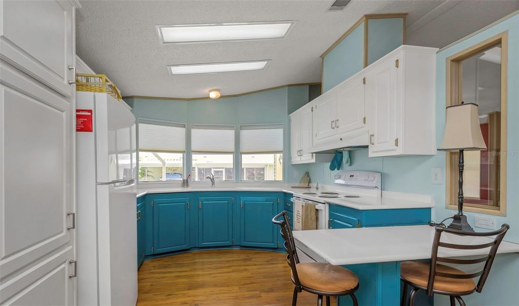 Photo of 106 Thatch Palm Street W, Largo, FL 33770 (MLS # TB8496638)