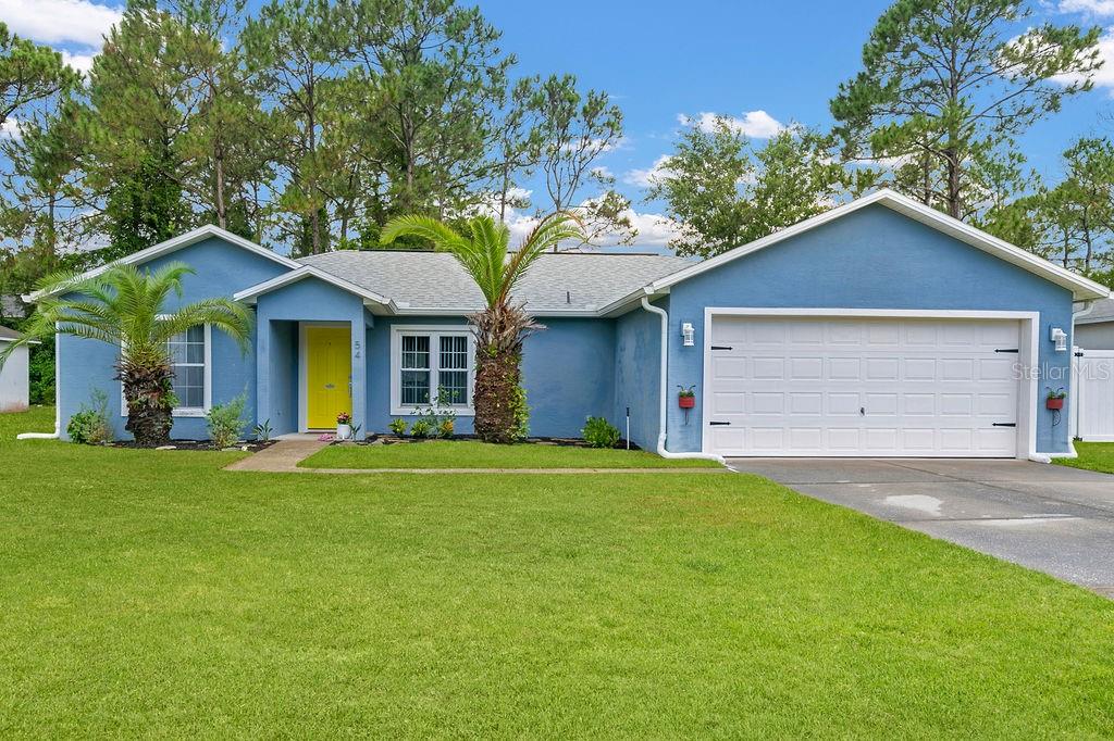 Photo of 54 Pennsylvania Lane, Palm Coast, FL 32164 (MLS # O6428730)