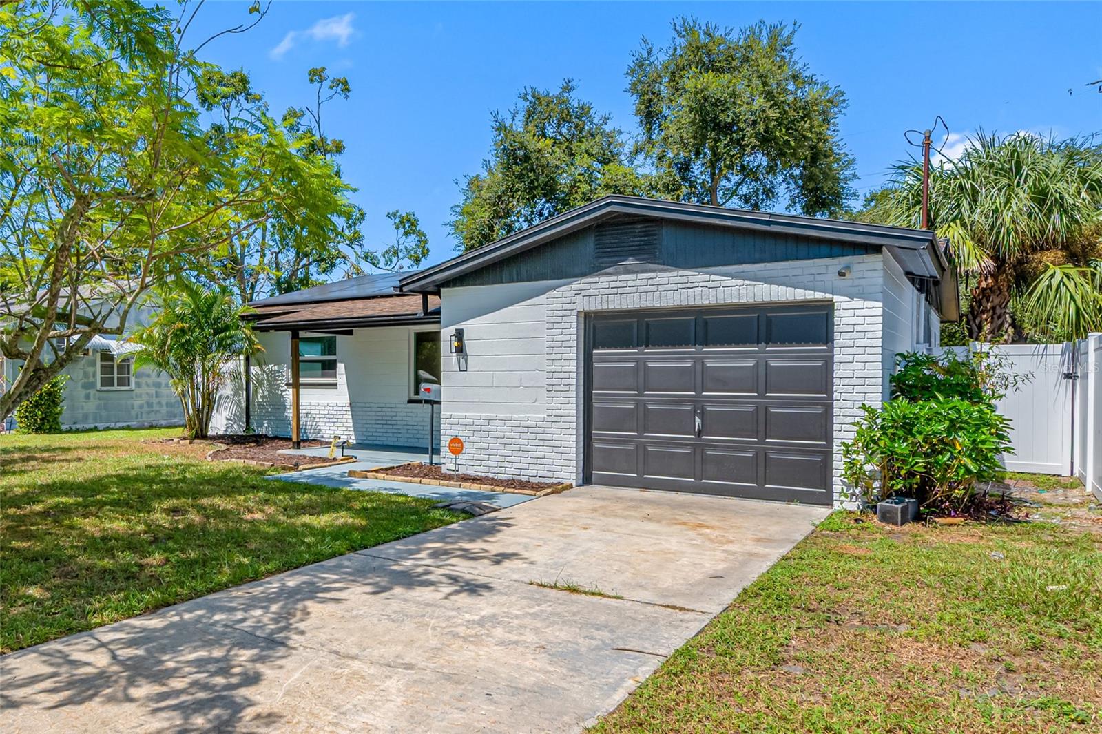 Charming & Affordable set on a quiet street in the Heart of St. Pete! NOT in a flood zone. This beautifully updated 2-bedroom, 2-bath home features a brand-new roof, paid-off solar panels that can even pay you back for power, a brand-new kitchen with soft-close birch wood cabinets and a sparkly white quartz countertop, updated bathrooms and vanities, new plumbing, new appliances, and updated electric for true move-in peace of mind. Built in 1973 and offering 1,000 sq ft of living space, the open-concept layout showcases luxury LVP flooring, central heating and cooling, and plenty of natural light, while the fenced-in private yard provides the perfect outdoor retreat. Perfectly located in vibrant St. Petersburg—“The Sunshine City”—you’ll enjoy easy access to beaches, parks, shopping, downtown attractions, and major highways, making this an incredible value in today’s market. Don’t wait—schedule your private showing today and claim your piece of Florida paradise!
Listing agent is the owner.