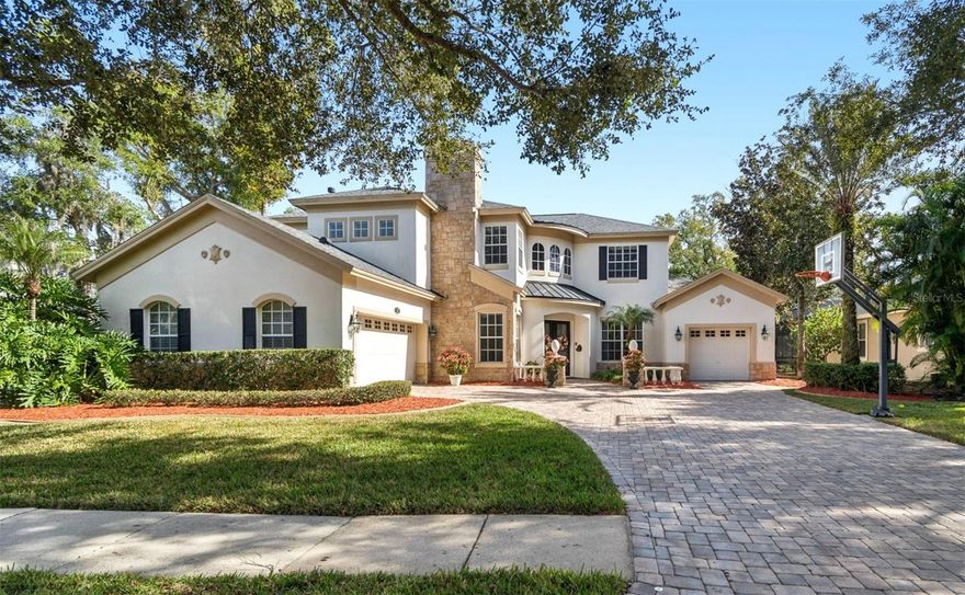 A truly exceptional residence within the GATED community of DEER CREEK in CARROLLWOOD. This 5-bedroom, 3-bath home + game room and loft features a large pool and outdoor kitchen, along with designer finishes and extensive high-end upgrades throughout.

From the moment you arrive, the PAVERED and LIGHTED driveway and elegant double French doors create a grand first impression. Inside, the home features designer chandeliers, PLANTATION SHUTTERS, crown molding throughout, custom built-ins, and integrated WHOLE-HOUSE AUDIO both indoors & outdoors.

The renovated CHEF’S KITCHEN is a true showpiece, featuring a JennAir professional SIX-BURNER GAS cooktop with griddle, DOUBLE OVEN range, built-in JennAir refrigerator, WINE refrigerator, Bosch dishwasher, built-in microwave drawer, enlarged island, granite countertops, and a hidden walk-in pantry offering exceptional storage and functionality. The BREAKFAST NOOK includes a planning desk and French doors that open to the POOL & BACKYARD OASIS, creating seamless INDOOR-OUTDOOR LIVING.

The family room offers a CUSTOM BUILT ENTERTAINMENT CENTER and flows into the 11x19 GAME ROOM, ideal for entertaining. Also located on the first floor is a flexible fifth bedroom that can easily serve as a home office or guest suite. A winding staircase leads upstairs to a LOFT, while the renovated primary suite features decorative molding, a wood-accented tray ceiling, a designer freestanding soaking tub, updated vanities, and a beautifully tiled walk-in shower. Three additional bedrooms and a third bathroom with double vanity and granite countertops complete the second level.

RECENT IMPROVEMENTS include a new downstairs Trane air conditioning system in 2025, upstairs air conditioning replaced in 2018, shingle roof replaced in 2018, variable-speed pool pump and saltwater pool generator installed in 2024, Rachio smart irrigation system added in 2024, smart thermostats installed in 2022, reverse osmosis water filtration system added in 2025, pool safety gate installed in 2023, updated lighting and flooring, interior repainting, home up-lighting, and paver landscape lighting.

Ideally located just minutes from CARROLLWOOD DAY SCHOOL, Avila Golf & Country Club, and numerous restaurants, with easy access to I-275 and Downtown Tampa. This home offers luxury, comfort, and peace of mind. A must-see.