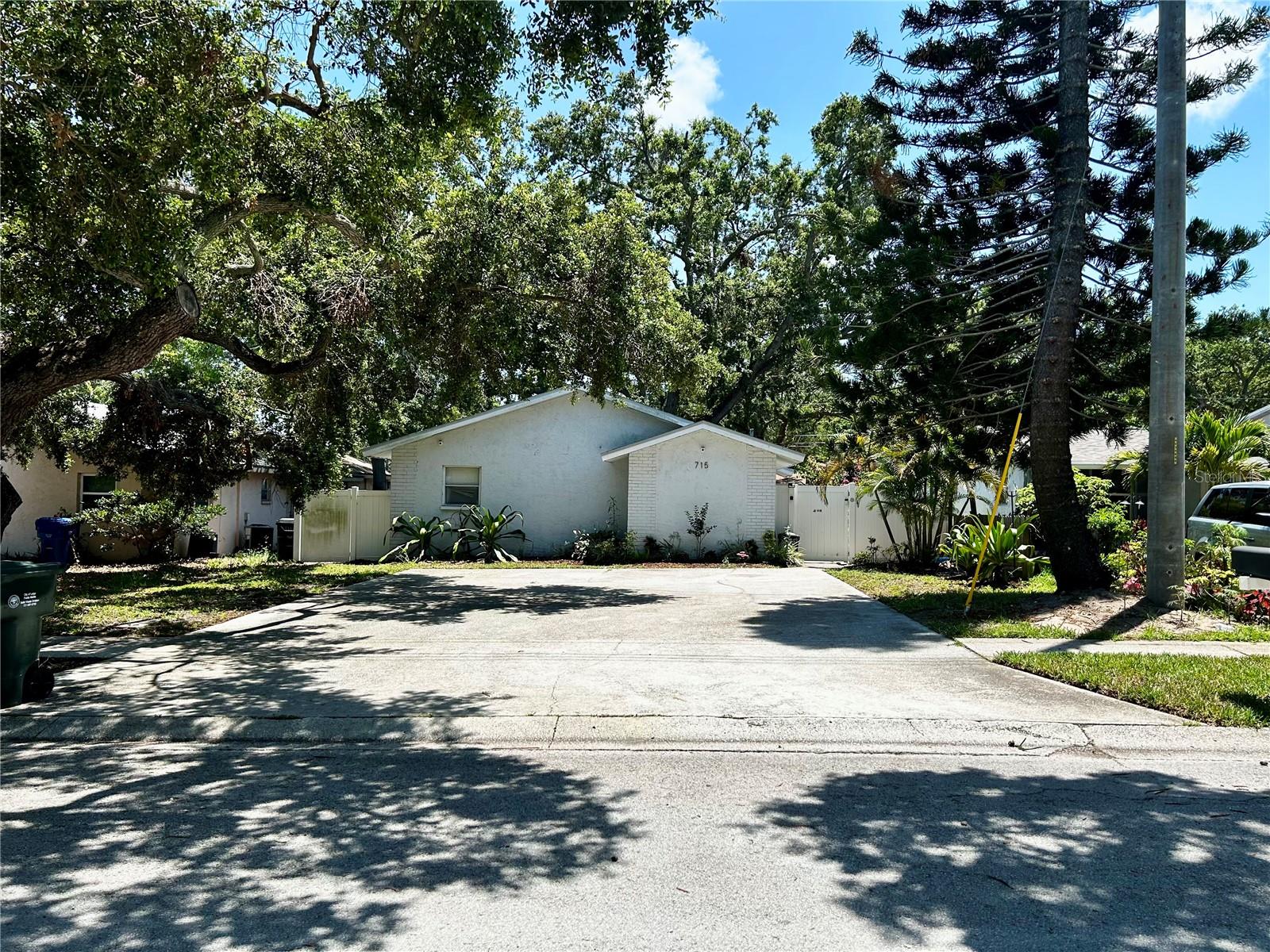 Don’t miss this exceptional investment opportunity in the heart of Largo! This fully renovated duplex offers 1,855 sq ft of total living space, split between a 2 bed / 2 bath unit and a 2 bed / 1 bath unit—ideal for house hacking, long-term rentals, or short-term rental income. Both units were completely updated in 2019, including new kitchens with 4-piece stainless steel appliances, bathrooms, flooring, and a new roof (2019). Additional major upgrades include a new HVAC system in Unit A (2021) and new hot water heaters in both units (2020/21). Utilities are separately metered for electric and combined for water. One unit is currently tenant-occupied, while the other is vacant and move-in ready. This property has strong short-term rental potential, previously listed on Airbnb and was consistently rented. Located minutes from the beaches, shopping, and downtown Largo, this is a rare chance to own a turnkey, low-maintenance duplex in a highly desirable location.