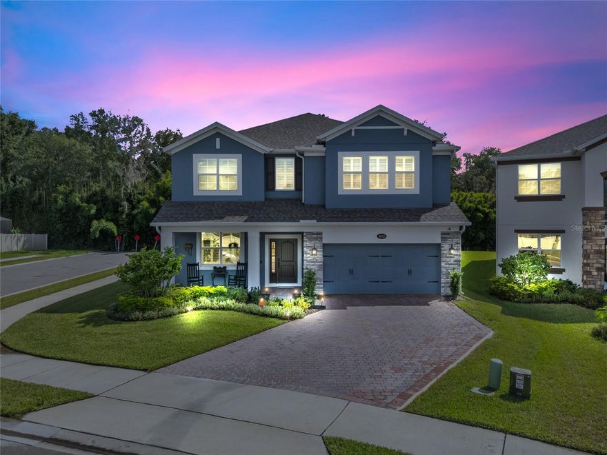 Welcome to 5615 Green Arrow Place in Sanford a stunning 5 bedroom, 4 full bath home loaded with upgrades and thoughtful details throughout! Step inside to discover a one-of-a-kind chef’s kitchen featuring upgraded quartz countertops with beveled edges, a double oven, premium range hood with spice rack and utensil hangers, real wood 42” cabinets with soft-close drawers, specialty spice and silverware drawers, custom pull-out pot and pan racks, and a butler’s pantry with microwave and mini fridge. The elegance continues with premium REAL Engineered Wood flooring, upgraded LED smart lighting, plantation shutters, electric roller blinds, and a built-in ceiling sound system in multiple rooms. Entertain with ease in the living room and loft, each designed with custom built-ins, fireplaces, and included 86” LG TVs. The luxurious owner’s suite offers quartz countertops, dual vanity sinks, dual shower heads, and an upgraded electric toilet with heated bidet, motion sense, auto flush, and heated dryer. A private guest suite with full bath and tub provides comfort and convenience for visitors. Throughout the home, you’ll find thoughtful enhancements such as premium wood and iron staircase banisters, custom laundry with premium tile, cabinetry and shelving, built-in fridge enclosure with upgraded LG refrigerator that makes cocktail ice, and pre-installed permanent holiday lights approved by the HOA. Even the garage and exterior were upgraded with care, offering an EV outlet, epoxy garage flooring, hanging shelving in the third bay, and an extended driveway. The premium corner lot provides a rare side street with no rear neighbors, just peaceful bamboo views. From smart upgrades to elegant finishes, this home truly has it all, blending luxury, comfort, and functionality in every detail.