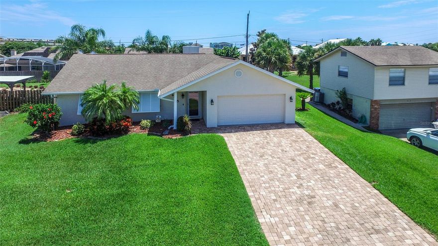 This beautiful 3 bed/2 bath home is located in the highly desirable "no drive beach area" just 2 blocks to the white sand beach and ocean. Also, you are just steps away from the boat ramp for kayaking or paddle boarding in the intra-coastal. Very well-maintained home features open concept kitchen and living room with cozy wood burning fireplace and vaulted ceiling. The split bedroom plan features two bedrooms and one bath off the living room. Stainless appliances are featured in the kitchen adjacent to the master bedroom/bath. There is also a formal dining room and a 2 car-garage and paver driveway. Relax on your serene lanai overlooking your inviting screened pool and tropical landscaping. For added privacy the yard is enclosed with vinyl fencing. This home has been meticulously maintained with many upgrades and is move in ready.  All measurements are approximates and should be verified by interested persons. ;Water: City