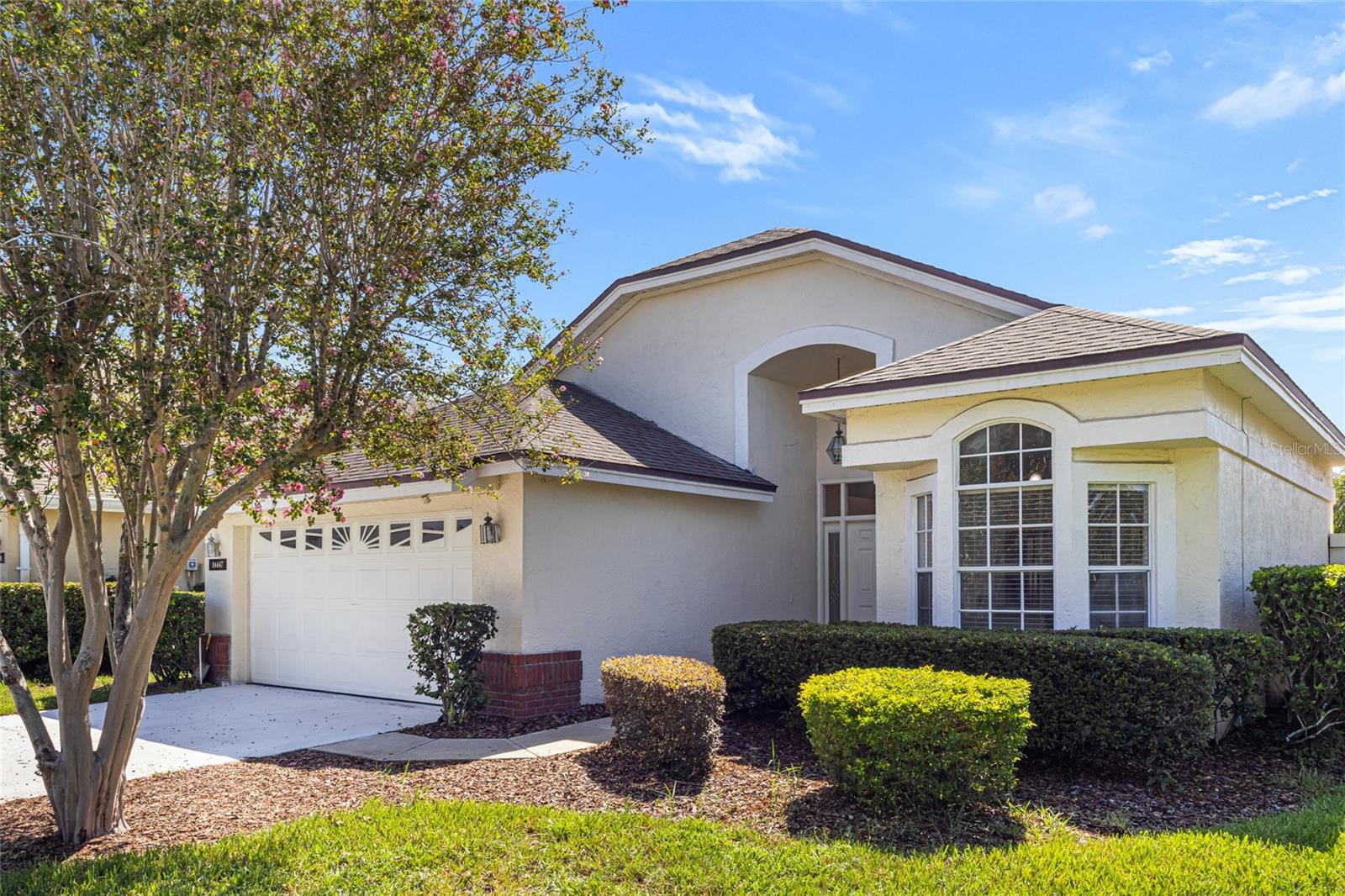 This 3-bedroom, 2-bath home in Hunter’s Creek strikes a rare balance between comfort and practicality. Set in a quiet, gated enclave, the interior is marked by high ceilings, great natural light, and tile floors throughout—no carpet in sight. The kitchen has been smartly upgraded with granite counters and newer stainless steel appliances, while both bathrooms offer refined touches like glass-enclosed showers. The primary suite adds a jetted tub and a walk-in closet with plenty of breathing room.
Recent updates, including a new A/C (2023), newer water heater, and washer and dryer (2023), offer peace of mind and help keep future maintenance costs down. The laundry room also includes a utility sink, adding convenience to everyday chores. Ceiling fans in every bedroom and the living room keep the air moving. Out back, the yard features thoughtfully designed landscaping and a layout that’s easy to enjoy.
Community amenities include a pool, sports courts, playground, and lots of inviting green spaces, with A-rated schools and public parks nearby. Surrounded by daily conveniences and major roadways, this home offers a location that’s as functional as the layout itself.