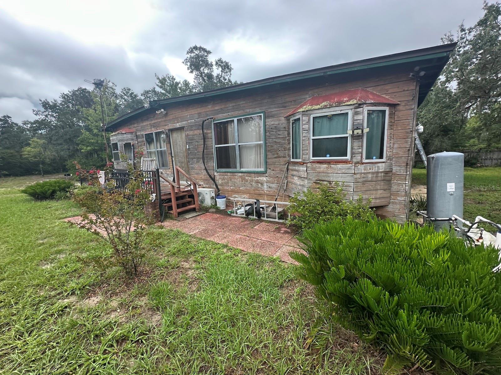 Rural, secluded and 2 minutes from Ocala National Forest and OHV(Off Highway Vehicle) trails that go for miles and miles. Don't miss this "Cabin in the Woods" with cedar siding, metal roof, update well, new mini split units and .36 acre oversized lot. Located 20 minutes from downtown Fort McCoy with a grocery store, doctor's office, pharmacy, hardware, gas station, pizza, and more. Short drive to Silver Springs which includes Walmart, Lowes, Bealls, Outback and many more of your favorite shopping spots and restaurants. Ocala is only another 10 minutes from Silver Springs with vibrant night life and lots of entertainment options and restaurants. Gainesville(Home of Florida Gators) is only 50 minutes to downtown. If you’re a fisherman, or hunter or simply love hiking, canoeing or kayaking you are in luck! Minutes to Ocklawaha River, Ocala National Forest, and many natural springs(Salt Springs, Silver Glen Springs, Juniper Springs), horseback and walking trails, and off-road vehicle trails await your explorations. One-of-a-kind property and location! Ready for new owners!