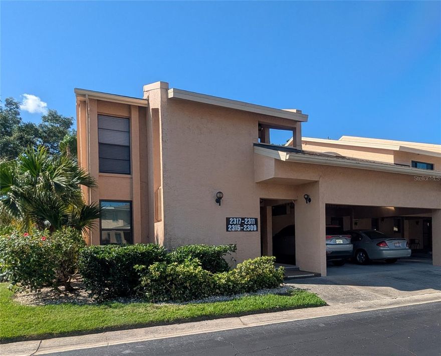 Spacious 2nd-Floor Condo – 2 Bed, 2 Bath with Lanai & Carport! Enjoy the convenience of in-unit washer and dryer in this bright and airy 2-bedroom, 2-bathroom condo. The open great room floor plan provides a welcoming living and dining space, while the separate eat in kitchen offers flexibility—it can serve as a home office! Relax on the private lanai, and take advantage of the included water, sewer, and basic cable provided through the HOA. Easy access to downtown, Fruitville, and SMH.