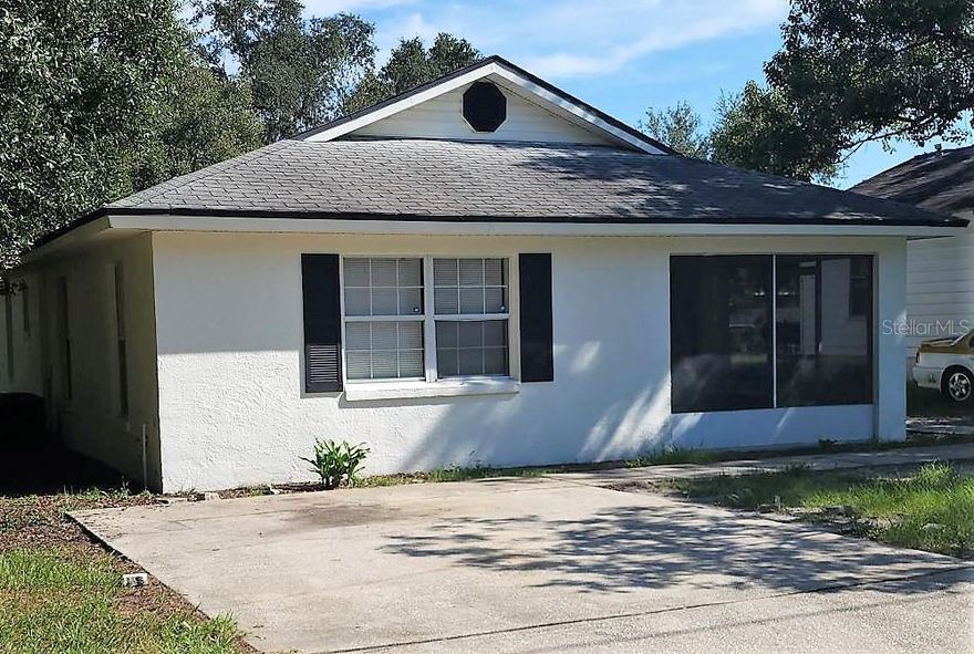 This recently upgraded single-family home is situated on a spacious fenced lot within the charming city of Lakeland. This property is full of tasteful renovations to include brand new flooring, a recently installed roof, new air handler, fresh paint throughout, and newly updated bathtubs and shower surrounds. The impressive large master bedroom includes an en suite bathroom with storage! The generous storage closet located at the rear of the house is truly exceptional. It offers ample space for organizing and stowing away your belongings. This property's prime location places it in proximity to both downtown Lakeland and the convenient I-4 highway, making it an ideal choice for those seeking a blend of modern comfort and accessibility in a thriving community.