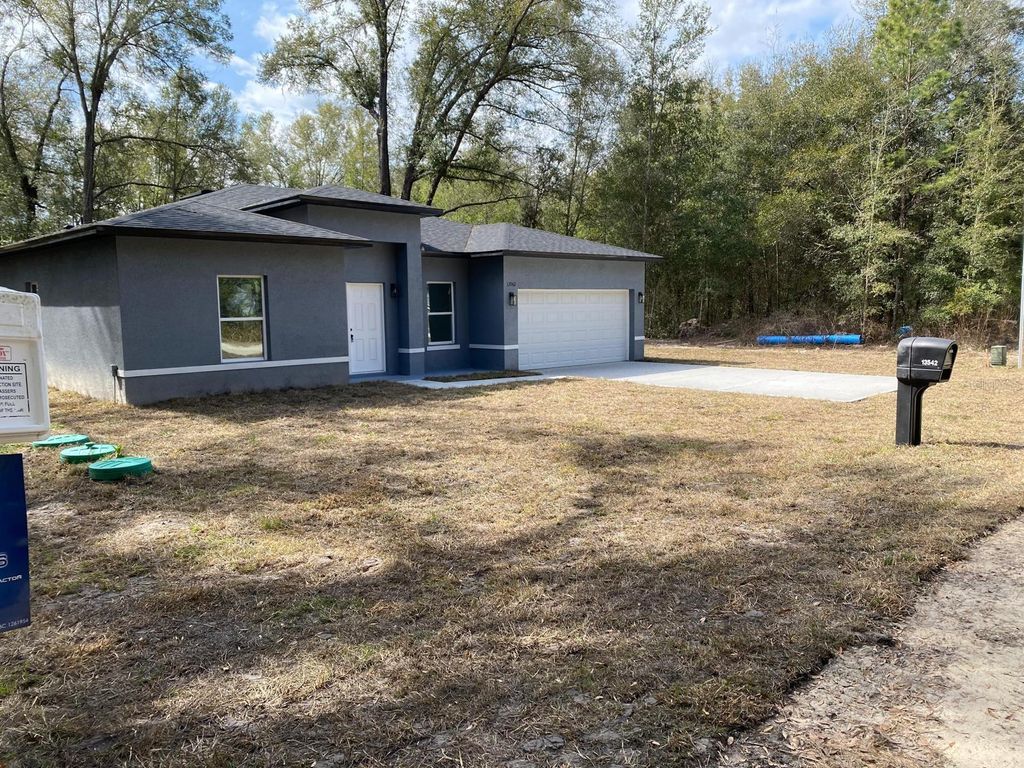 Photo of 13542 SW 114th Place, Dunnellon, FL 34432 (MLS # O6401032)