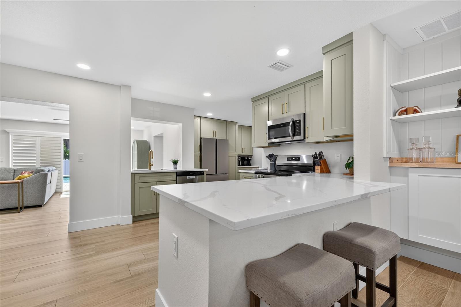 SUN-LIT SHORES - Residential