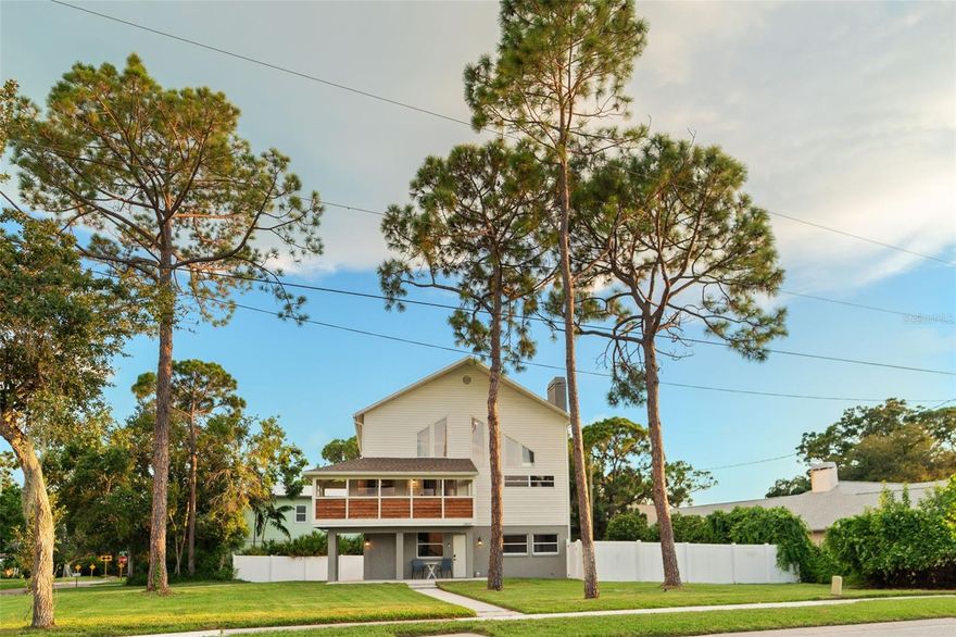 Welcome to your newly renovated dream home, a luxurious oversized corner lot property located in a No Flood Zone and just 1/4 mile from the beach! This stunning residence features 6 spacious bedrooms and 3.5 beautifully appointed baths, offering an ideal blend of comfort and elegance.


    As you step inside, a welcoming foyer greets you, setting the tone for what lies ahead. Through bright French doors, you’ll find a versatile first-floor living area—perfect for an in-law suite, private office, or lucrative rental option, complete with its own separate entrance. Cozy up in the inviting living room, featuring a stylish updated fireplace that creates a warm ambiance, while a convenient laundry closet with a stackable washer and dryer adds functionality.


    Venture upstairs, where you'll be greeted by a flood of natural light illuminating the soaring vaulted ceilings and expansive windows. The open-concept living and dining spaces, adorned with a chic wet bar, create an entertaining haven that's perfect for hosting friends and family. Step outside to the expansive wrap-around porch, where you can unwind and take in the breathtaking neighborhood views—imagine adding stairs for an elegant primary entrance!


    The gourmet kitchen is a chef’s masterpiece, showcasing sleek quartz countertops, top-of-the-line stainless steel Samsung smart appliances, and convenient soft-closing cabinetry. Enjoy casual meals in the charming breakfast nook or gather around the eat-in bar with loved ones. The second level also features two generously sized bedrooms connected by a luxurious Jack and Jill bathroom, complete with double vanity sinks, quartz countertops, and a stunning stained glass window that embodies the vibrant Florida lifestyle.


    Continue to the third floor, where the primary bedroom awaits, complete with a designer luxury walk-in closet for all your storage needs. The spa-like primary bathroom serves as your oasis, highlighted by a freestanding soaker tub, frameless walk-in shower, a private commode, and double vanity sinks with quartz accents. There are also two additional bedrooms and a half bath on the third floor, providing ample space for family or guests. One bedroom can be used as an office, nursery, or game room with a view of your front yard. The other bedroom features a nook underneath the staircase and a private loft room located up the stairs, perfect for a sibling shared bedroom, private office, in-home yoga space, or play area.


    Dreaming of a pool? There’s ample space in your backyard, and Duke Energy is ready to facilitate an upgrade to utilities to make your outdoor oasis a reality. Centrally located in unincorporated Pinellas County, you're less than a quarter mile from award-winning Gulf Beaches, public boat ramps, and the picturesque Pinellas Trail.


    Experience the vibrant lifestyle of the nearby Seminole City Center, just two miles away, featuring shopping, dining, and entertainment options. With easy access to the interstate, you’re only 25 minutes from the cultural hotspots of Downtown Tampa, Dunedin, and St. Petersburg, where incredible sporting events, concerts, nightlife, and farmers markets await.


    This unparalleled home is more than just a property—it's a lifestyle investment in the vibrant Florida community. Seize the opportunity to make this exceptional home yours today—where luxury living meets coastal paradise!