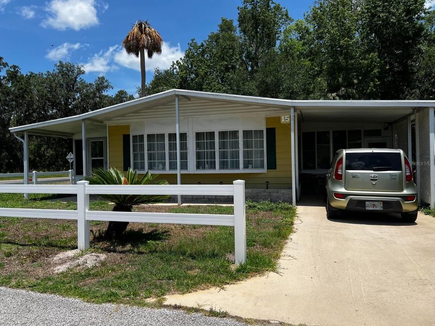 Great starter home just steps from the lake with private water access to the Withlacoochie River and Lake Panasoffkee! Just across the boat ramp is a lovely picnic area and a bridge you can fish from. The home also has a workshop that includes its own bathroom and a detached shed for storage. The home is only minute away from shopping, golf, dining and much more. Its only 30 minutes from The Villages where there is unlimited free entertainment.