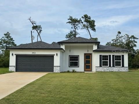 Photo of 3901 SW 161st Loop, Ocala, FL 34473 (MLS # O6432195)
