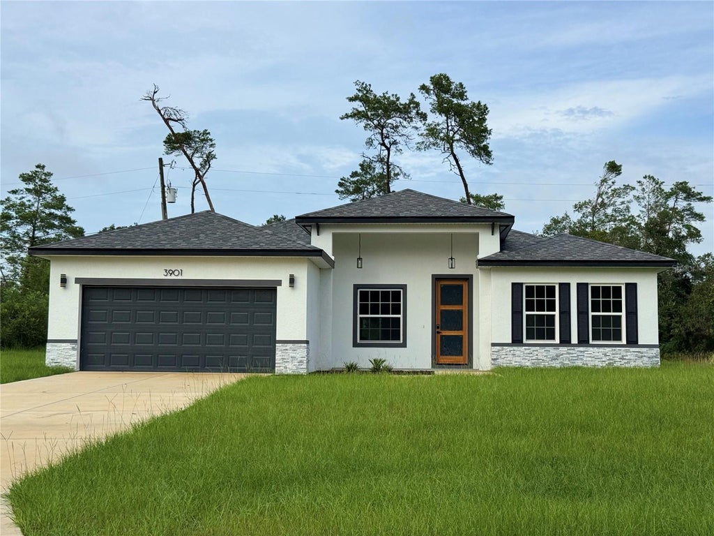 Photo of 3901 SW 161st Loop, Ocala, FL 34473 (MLS # O6432195)
