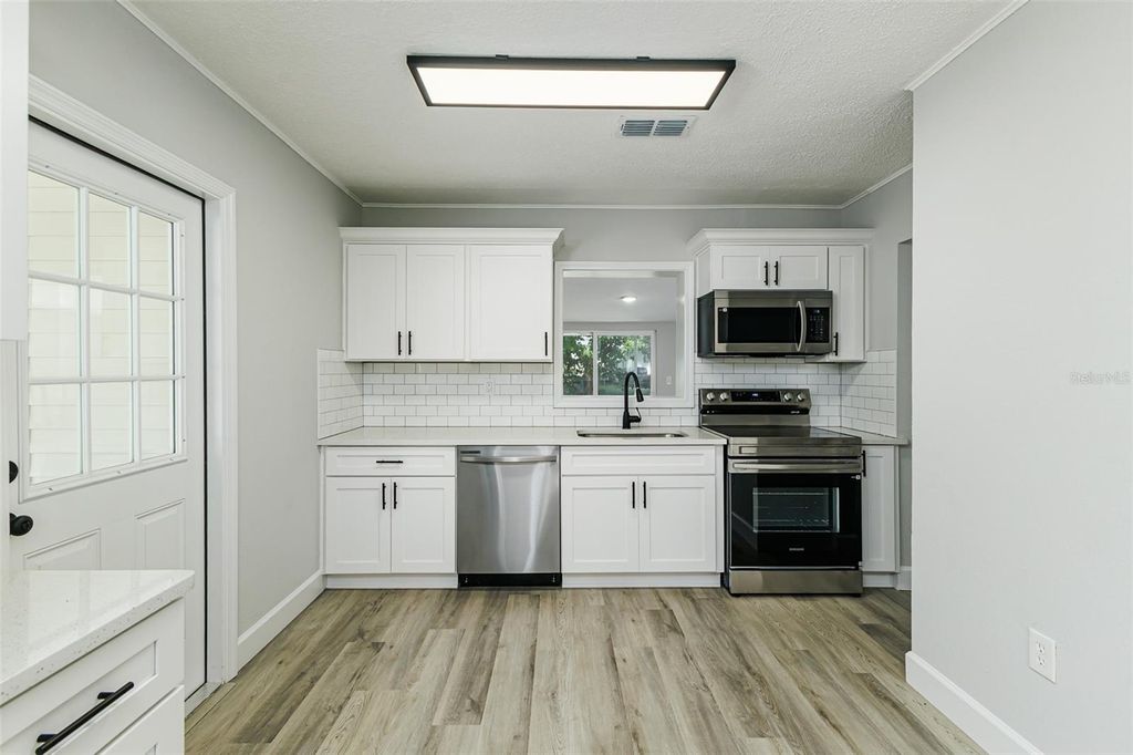 Photo of 2606 Highland Avenue, Plant City, FL 33563 (MLS # L4961799)