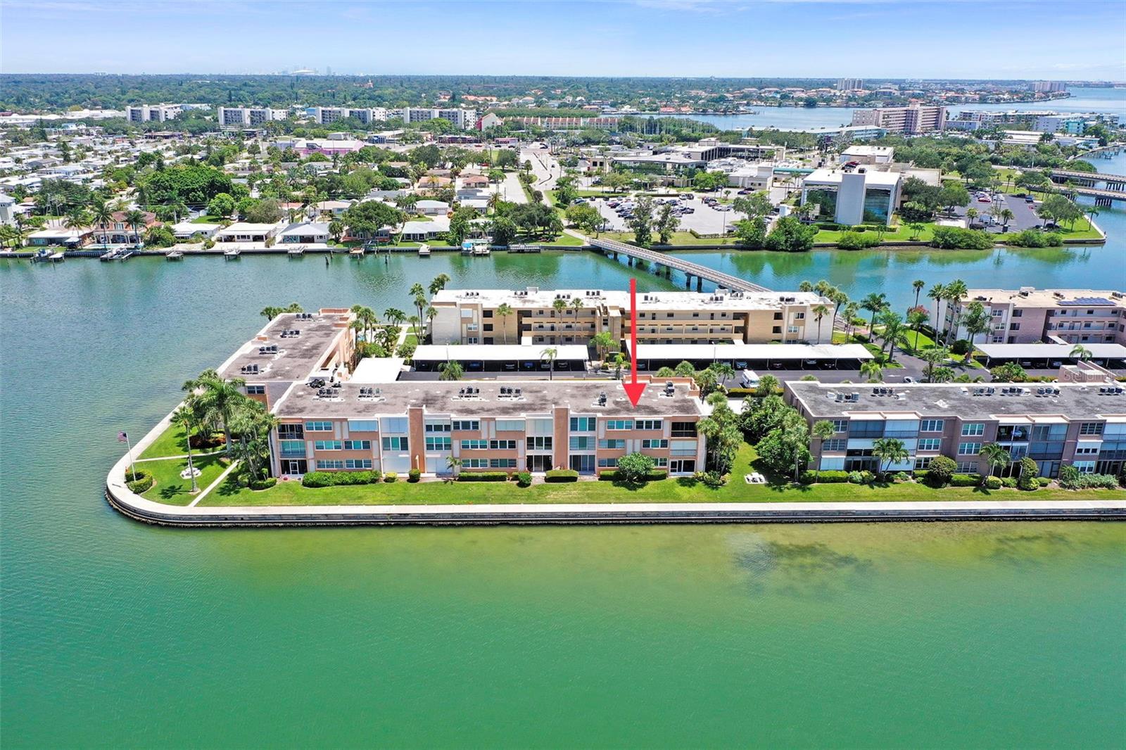 Live every day as if you are on vacation. This FULLY FURNISHED condo has spectacular views from the bedroom and living rooms. Hurricane rated energy efficient windows help keep the rooms cool while you watch the Florida wildlife swim by. Enjoy playing on the four pickleball courts, two tennis courts and the shuffleboard courts followed by a dip in one of the 5 community pools. Grill waterside at the park. Inside you have a modern kitchen and bathroom as well as everything you need to live the island life all the way to beach chairs and a sun shade. Quick drives to the beach as well as Saint Petersburg if you crave a little night ilfe. Guarded gates keep the community safe. This is a 55+ community