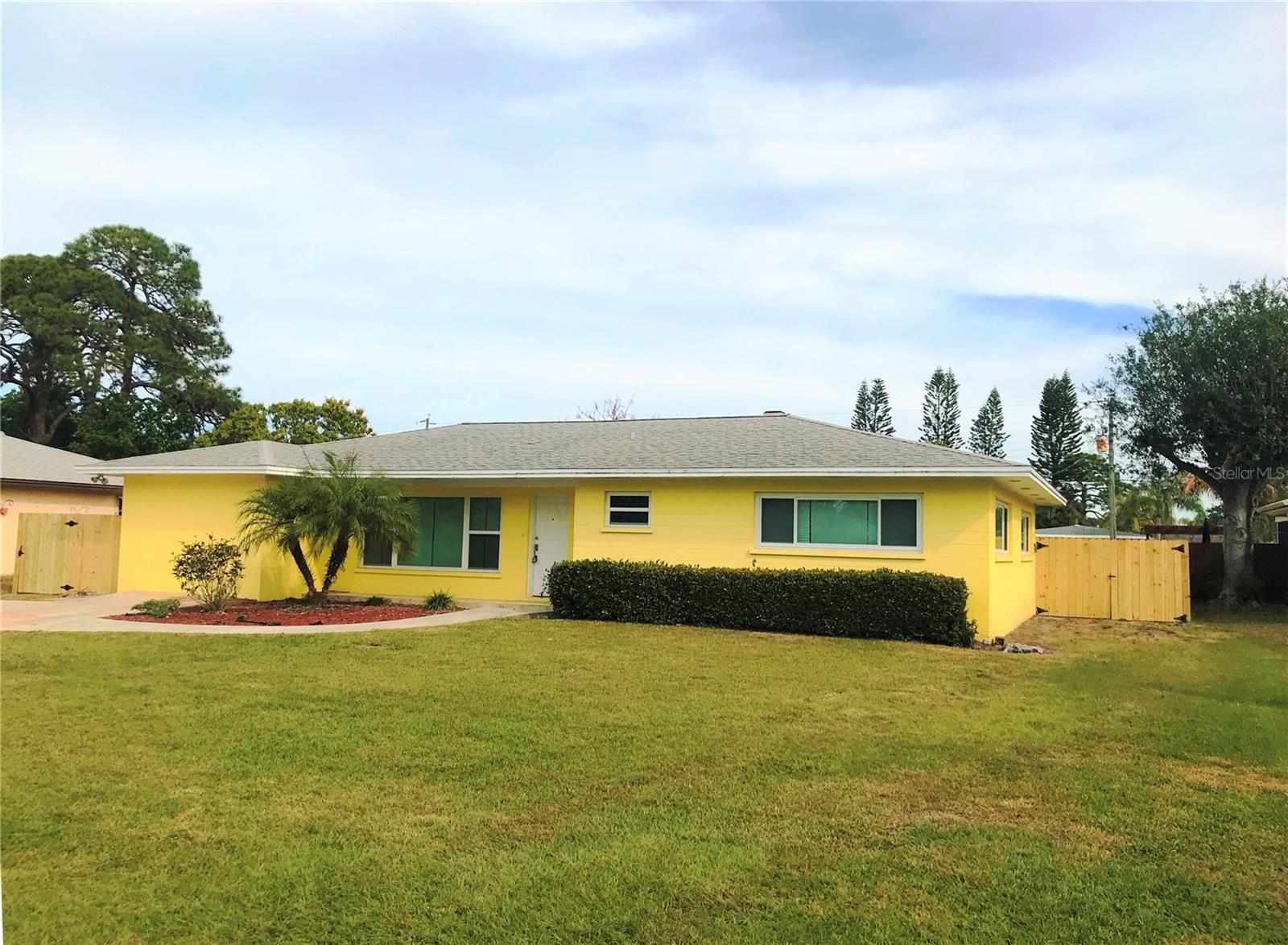Available for immediate move in. Nicely renovated 3 Bed 2 Bath Vintage home located in Historic Palma Sola Park. This neighborhood home is located just 3 blocks from Palma Sola Bay & just 10 minutes from the Beaches of Anna Maria Island. This totally renovated home features a Wood Burning Fireplace and a Large Fenced Back Yard. (PET FRIENDLY). Offering a spacious 1,740 sq. ft that includes a Large Bonus Room off the Kitchen. The Interior Features 3 Bedrooms and 2 Full Baths. The Family room offers a relaxed setting with an open floor plan with Wood Burning Fireplace. The Kitchen features Stainless Steel Appliances and an Abundance of Cabinet Space. Through your Kitchen window you'll enjoy viewing upon your expansive back yard paradise. A Large Fenced Back Yard with ample space for a Boat, Playground Equipment or even a Garden. An Enclosed Screened Porch off the Family Room is perfect for Entertaining, Breakfast or, sharing afternoon Cocktails with Friends. Lawn Service Include with Rent. Washer /Dryer Included.