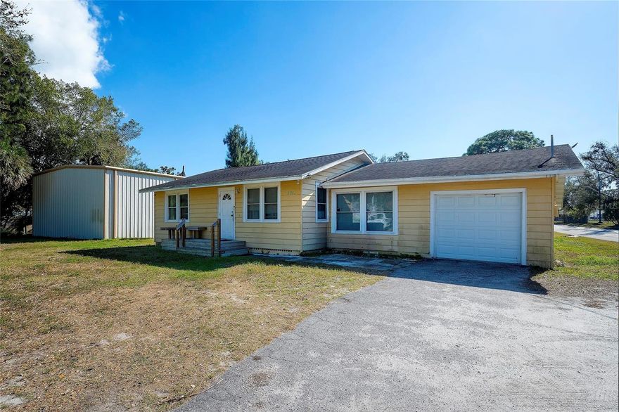 GREAT OPPORTUNITY.... Over 1/2 ACRE Corner Lot with 3bd/1ba Home, Attached Garage, and HUGE STORAGE BUILDING. So many options. Whether for a business that requires storing trucks and/or large equipment, or you need room for an RV, boat, cars, a Home-based Business, or Workshop, there's plenty of room for all that. Roof on the home is 2016. Use as your primary residence or as a rental. NO HOA. Located on a dead-end street with easy access to 53rd Ave (SR 70), and close to shopping, restaurants, medical, the SRQ Airport, and only minutes to our beautiful coastal beaches on the Gulf of America. Located in a NO FLOOD ZONE, too. Add your personal touches with some refresh and updates and you will have a great investment!