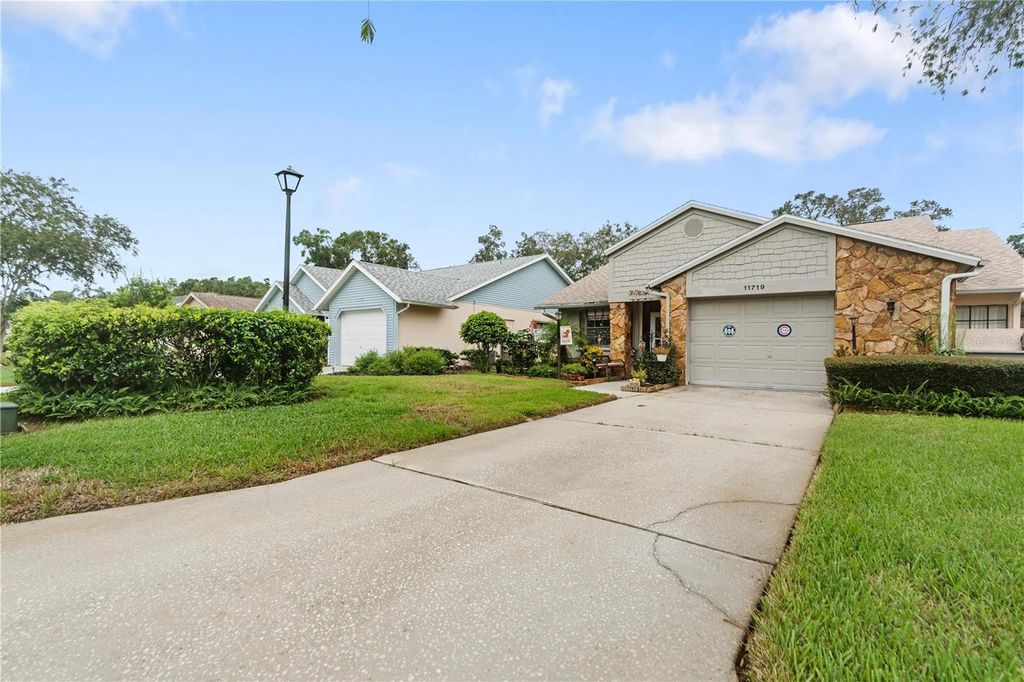 Photo of 11719 Rose Tree Drive, New Port Richey, FL 34654 (MLS # W7878810)