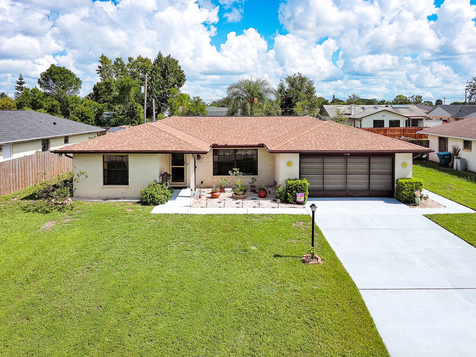 Welcome to this beautifully maintained 2-bedroom, 2-bathroom home featuring a versatile bonus room and 1,538 square feet of comfortable living space! From the moment you arrive, you'll notice the charming exterior and undeniable curb appeal that sets this home apart.
Inside, you'll find updated flooring and fresh paint that create a bright, inviting atmosphere throughout. The open and functional layout offers flexibility for modern living, with the bonus room perfect for a home office, 3rd bedroom/guest space, or hobby area.
Both bedrooms are generously sized leaving ample space for furnishings without feeling crowded. The kitchen flows seamlessly into the living and dining areas, ideal for entertaining or relaxing at home. Step outside to a fully fenced-in oasis — the peaceful and serene landscape allows for enjoying quiet evenings outdoors, perfect for pets and gardening. A 1-YEAR-OLD ROOF adds peace of mind, making this home move-in ready! This home is just a few minutes drive to I-4, shopping, schools and just 30 minutes to Orlando or the Beaches!
Pride of ownership is evident in every detail — don’t miss your chance to own this gem! Schedule a showing today!