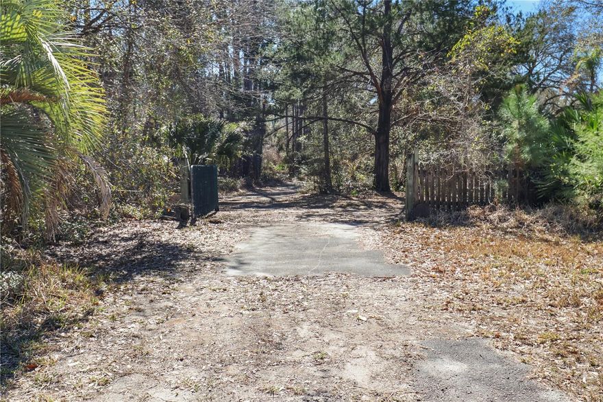 This 1.43 corner lot offers excellent potential for building your dream home or investment property. The property includes a septic system and well, providing a self-sustaining setup. Additionally, there is a carport and blacktop, ideal for parking or storage.
Enjoy proximity to Dead Lake, known for excellent freshwater fishing, particularly for speck, bass, and catfish. The lot is also near Lake Disston and Lake Geneva, offering plenty of opportunities for outdoor activities.
Conveniently located near Palm Coast and Daytona Beach, you’ll have easy access to shopping, dining, and entertainment. The Flagler Palm Coast Mall and local restaurants are just a short drive away. This is a rare opportunity to own a prime corner lot in a growing area! Buyer is responsible for all improvements & due diligence is advised. All information recorded in the MLS is intended to be accurate, but cannot be guaranteed. Schedule a showing today!