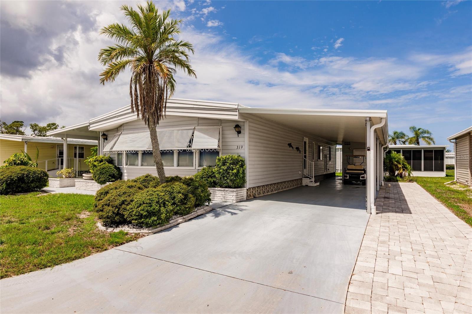 Beautiful home in Kings Gate Club a 55 + community where you can be as active as you want to sit back and just relax. Priced to sell! Close to shopping and Sarasota Memorial Hospital. New vinyl plank flooring and fixtures along with newer furniture. Guest bath granite countertop and pass-through door to guest room. Beautiful Lanai to enjoy 24 hrs a day. 2 Bed room 2 bath home with an extra room for dining, tv room, or what ever you choose. Close to all the beaches, Siesta Key , Nokomis, Venice.