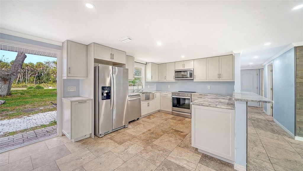 Photo of 1203 Pineland Avenue, Venice, FL 34285 (MLS # A4679605)