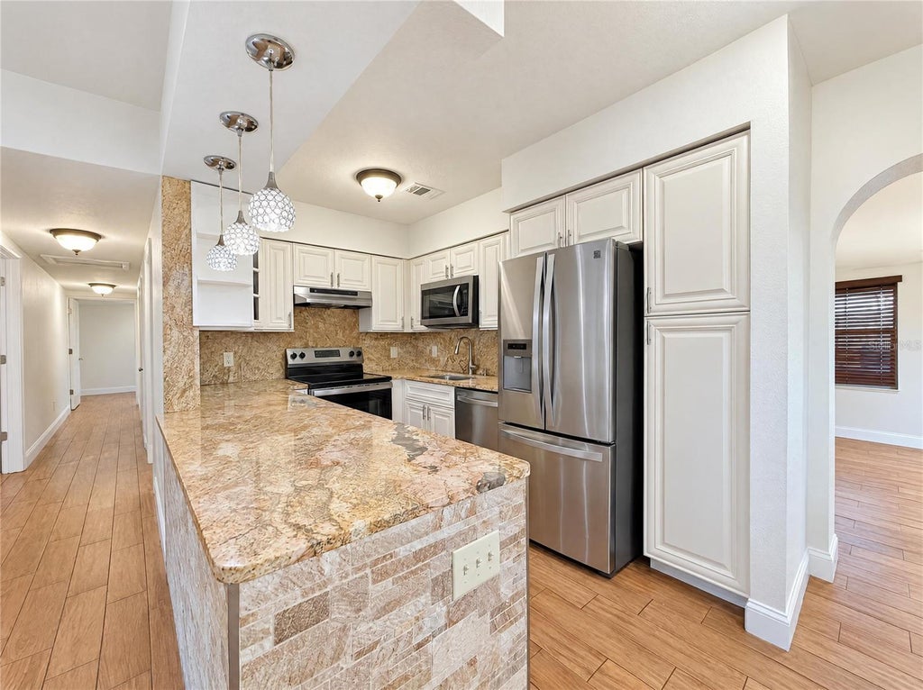 Photo of 3205 W Rogers Avenue, Tampa, FL 33611 (MLS # O6453111)