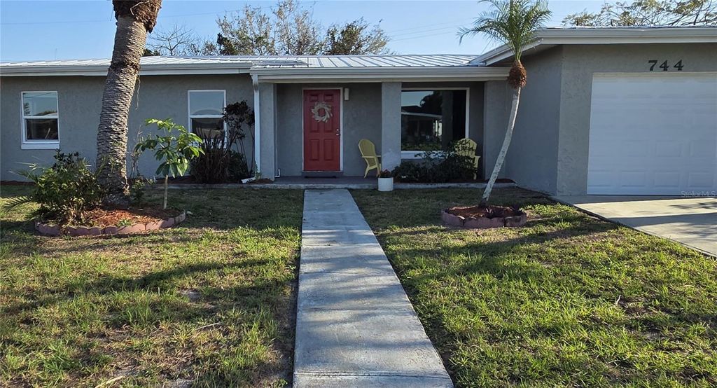 Photo of 744 Conreid Drive NE, Port Charlotte, FL 33952 (MLS # C7523608)