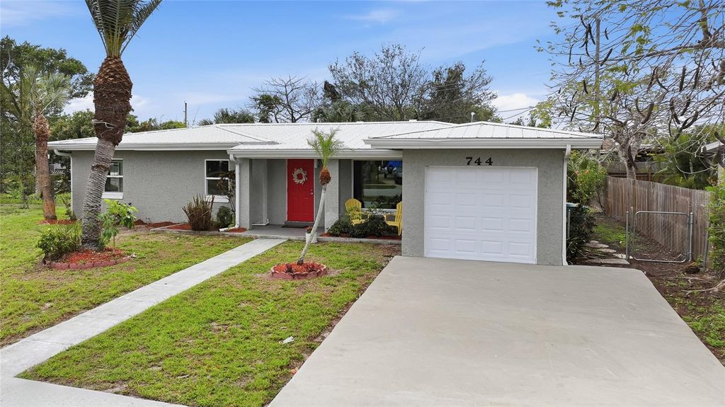 Photo of 744 Conreid Drive NE, Port Charlotte, FL 33952 (MLS # C7523608)