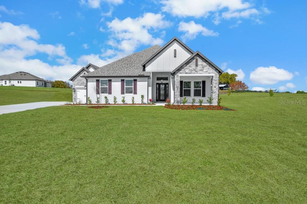 Photo of 3836 Saddle Hill Trail, Fruitland Park, FL 34731 (MLS # G5111458)